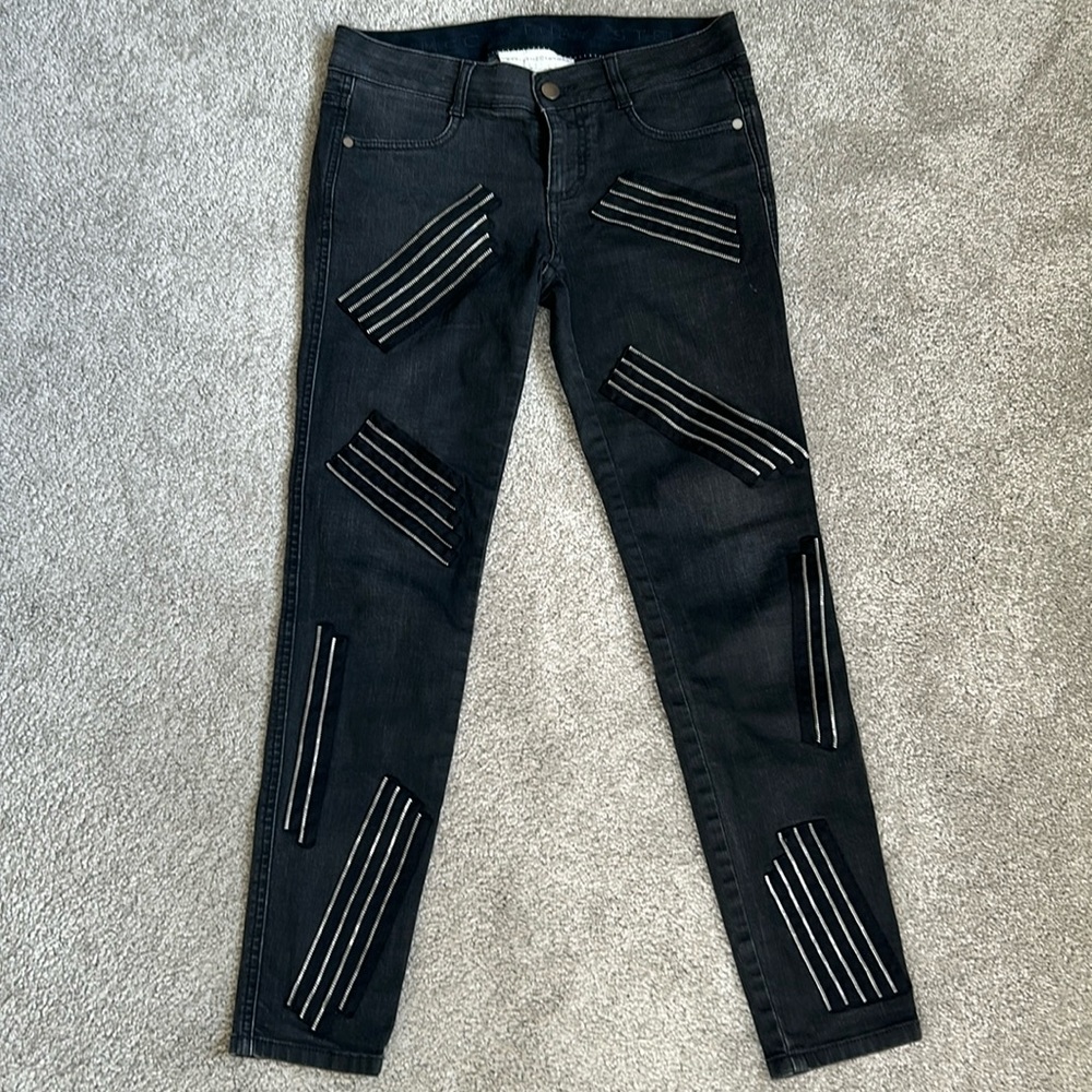 Stella McCartney black jeans with zip patch embellishments. Size 26